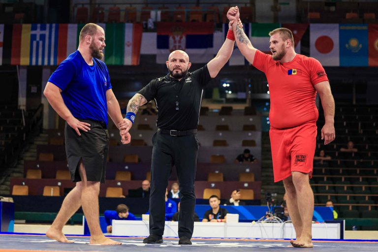 Romanov returns to win 130kg gold; Prendes repeats