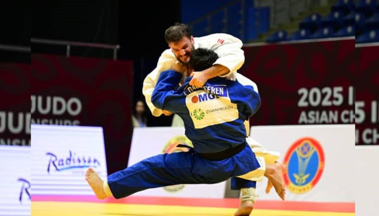 Mousa Gholami (IRI) taking the lead._compressed
