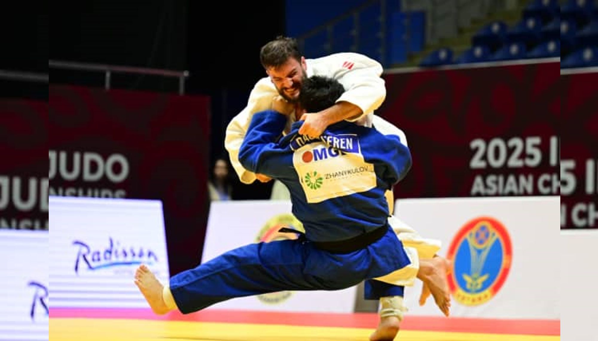 Mousa Gholami (IRI) taking the lead._compressed