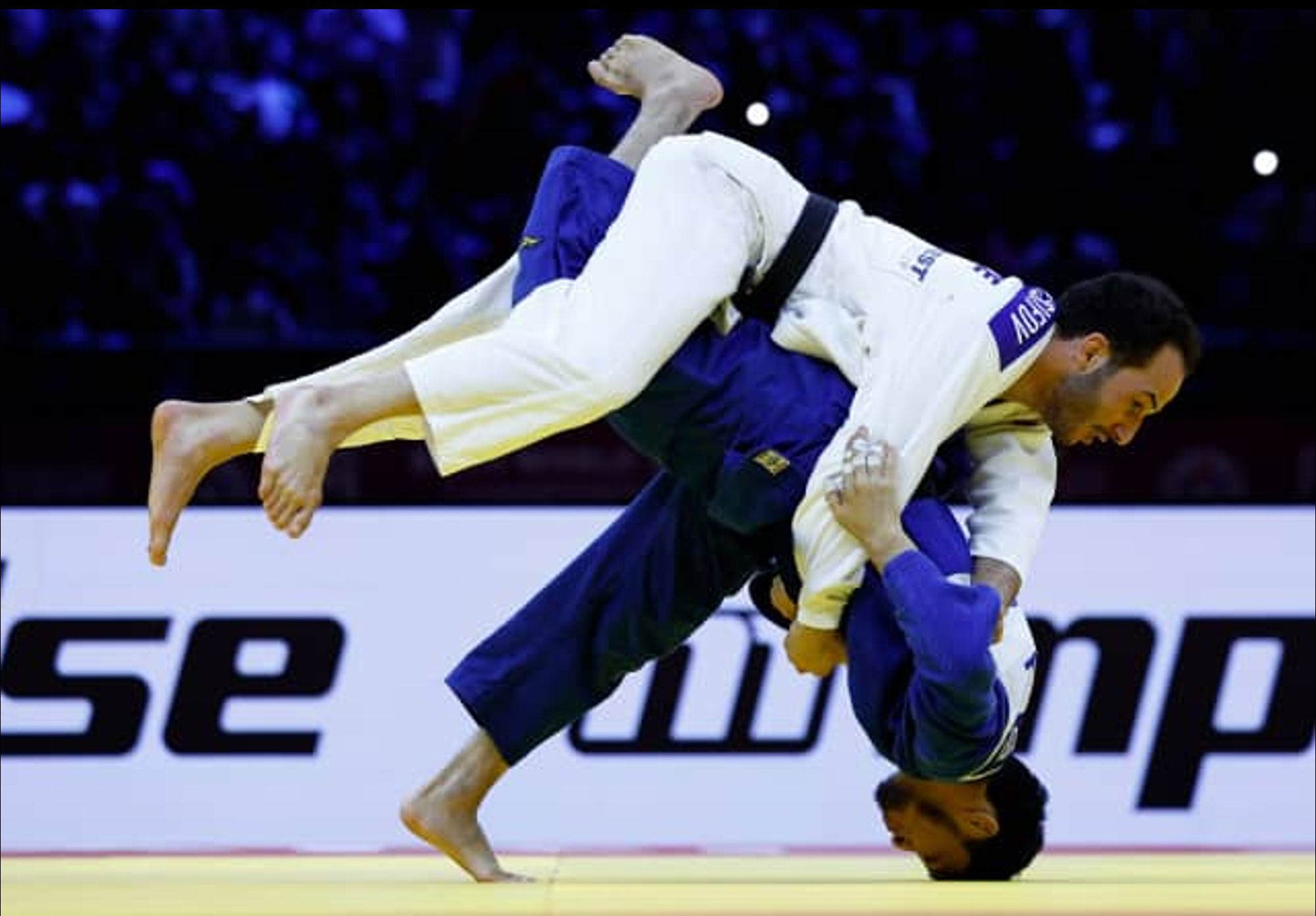 Ahmad Yusifov (in white) takes the gold for Azerbaijan @